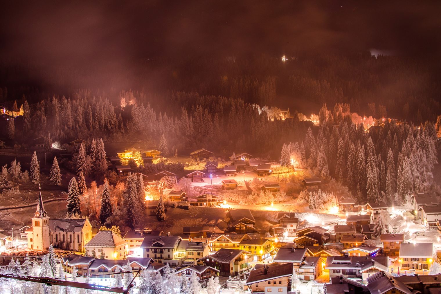 An amazing ski resort in mountains during a Christmas ski holiday 2024